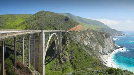 Majestic Coastal View with Breathtaking Bridge wallpaper