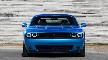 Sleek Blue Muscle Car Wallpaper wallpaper