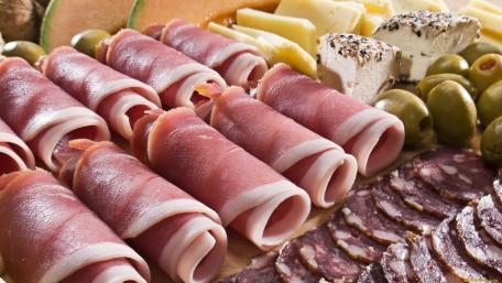 Delicious Charcuterie Platter with Meats and Cheeses wallpaper