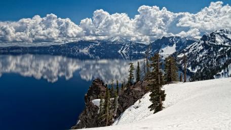 Majestic Crater Lake Reflections in Nature's Embrace wallpaper