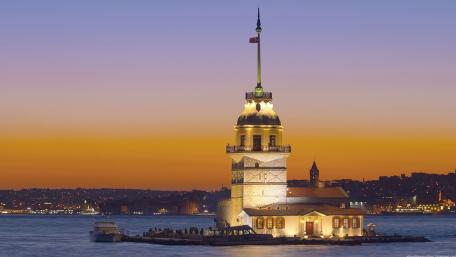 Majestic Maiden's Tower at Dusk Overlooking the City Skyline wallpaper