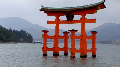 Serene Torii Gate Amidst Tranquil Waters wallpaper