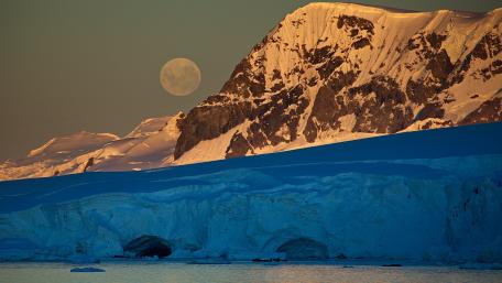 Majestic Moon Over Snowy Peaks wallpaper