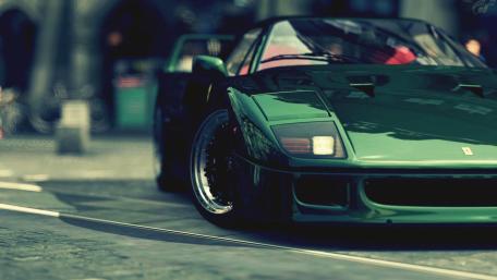 Sleek Green Sports Car on Urban Streets wallpaper