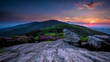 Serene Sunset Over Mountain Landscape wallpaper