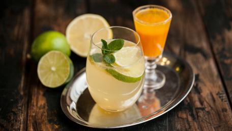 Refreshing Citrus Drink Display in Elegant Setting wallpaper