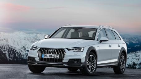 Sleek Audi A4 Allroad in Majestic Mountain Scenery wallpaper