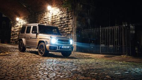 Sleek Night Drive Under the Bridge wallpaper