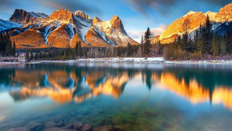 Majestic Mountains Reflected in Tranquil Waters wallpaper