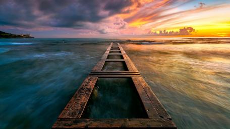 Sunset Whispers Over Seaside Pier wallpaper