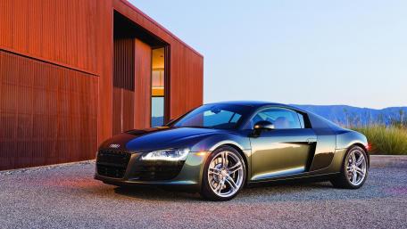Sleek Audi R8 Against Modern Architecture wallpaper