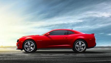 Sleek Red Sport Car on the Track wallpaper