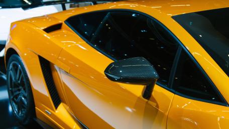 Sleek Orange Supercar Design Inspiration wallpaper
