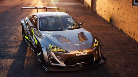 Sleek Performance Car Ready for Action wallpaper