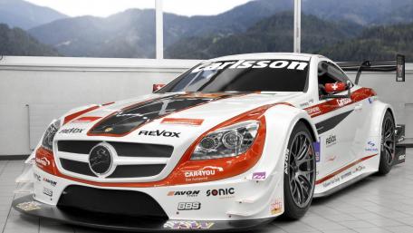 Racing Glory on Display in High-Performance Wallpaper wallpaper