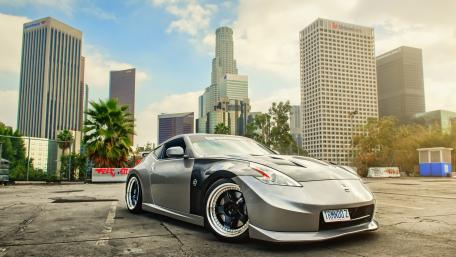 Sleek Nissan Z in Urban Landscape wallpaper