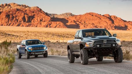 Powerful Trucks in the Desert Landscape wallpaper
