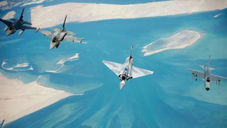 Military Jets in Formation Over Scenic Waterscape wallpaper