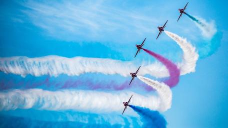 Aerial Acrobatics in Vibrant Colors wallpaper
