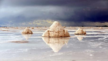 Majestic Salt Flats Under Stormy Skies wallpaper