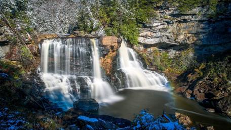 Serene Winter Waterfall Scene wallpaper