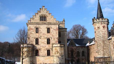 Majestic Castle Under Clear Blue Skies wallpaper