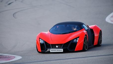 Sleek Marussia Supercar on the Track wallpaper