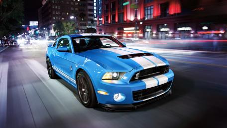 Vibrant Night Drive with a Classic Muscle Car wallpaper