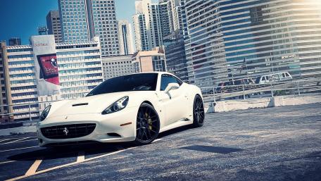 Sleek White Ferrari in Urban Landscape wallpaper