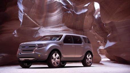 Sleek SUV in a Stunning Canyon Setting wallpaper