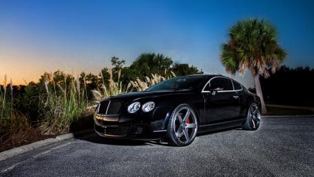 Sleek Black Beauty Under Dusk Sky wallpaper