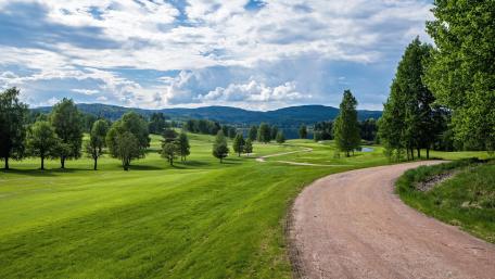 Serene Landscape of Lush Green Golf Course wallpaper