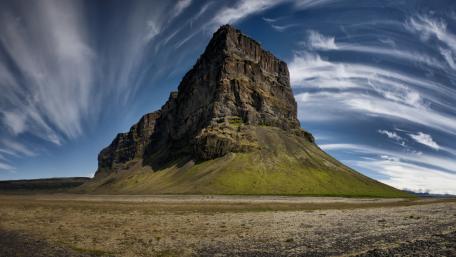 Majestic Mountain Amidst Dramatic Skies wallpaper