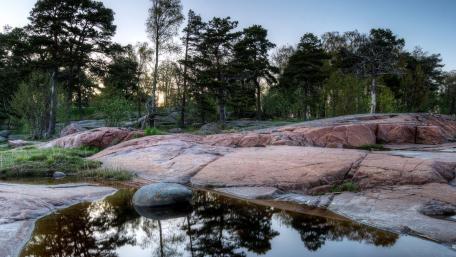 Serenity of Nature’s Rocky Shoreline wallpaper