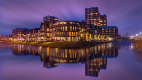 Enchanting Purple Cityscape Reflection wallpaper