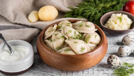 Delicious Dumplings Plated Beautifully wallpaper