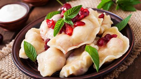 Delicious Dumplings with Cherry Topping wallpaper