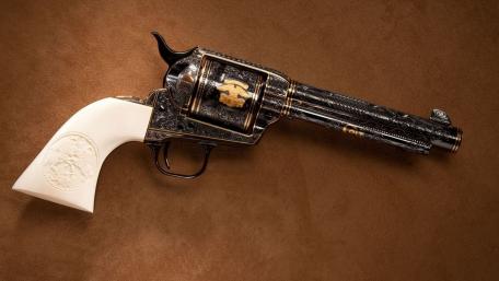Elegant Military Revolver with Intricate Design and Classic Aesthetics wallpaper
