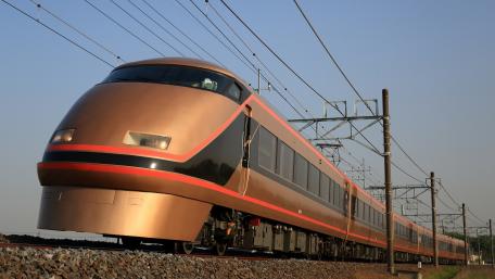 Sleek Modern Train in Motion wallpaper