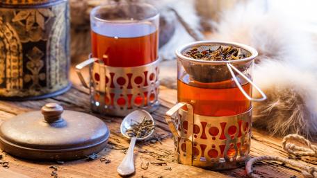 Warm Tea in Elegant Glasses for Cozy Moments wallpaper