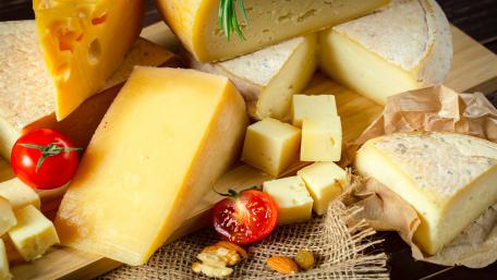 Cheese Delight on a Wooden Board wallpaper