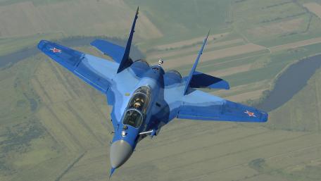 Soaring Blue Fighter Jet Wallpaper in 4K Quality wallpaper