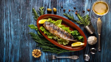 Grilled Fish Delight on Rustic Table wallpaper
