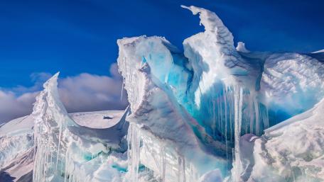 Glacial Majesty in Ethereal Blue Frost wallpaper