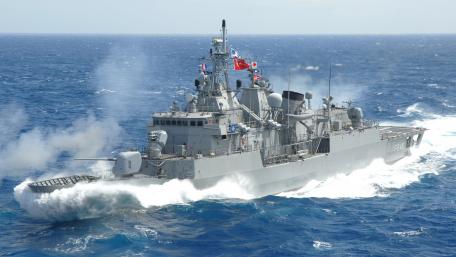 Majestic Naval Power in Action wallpaper