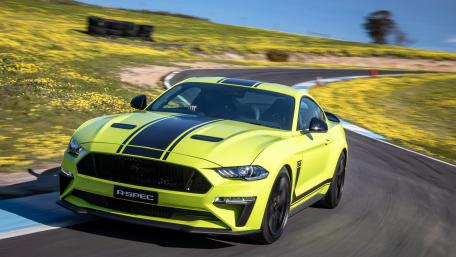 Bold and Dynamic Yellow Sports Car Wallpaper wallpaper