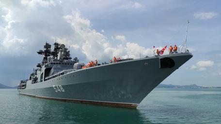 Majestic Warship in Tranquil Waters wallpaper