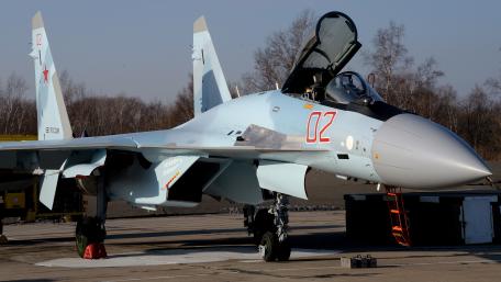 Sleek Military Jet on the Ground wallpaper