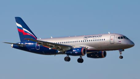 Sleek Aeroflot Aircraft in Clear Blue Sky wallpaper