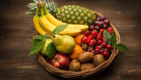 Vibrant Fruit Basket Displaying Nature's Bounty wallpaper